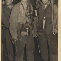 Minatori coi loro attrezzi